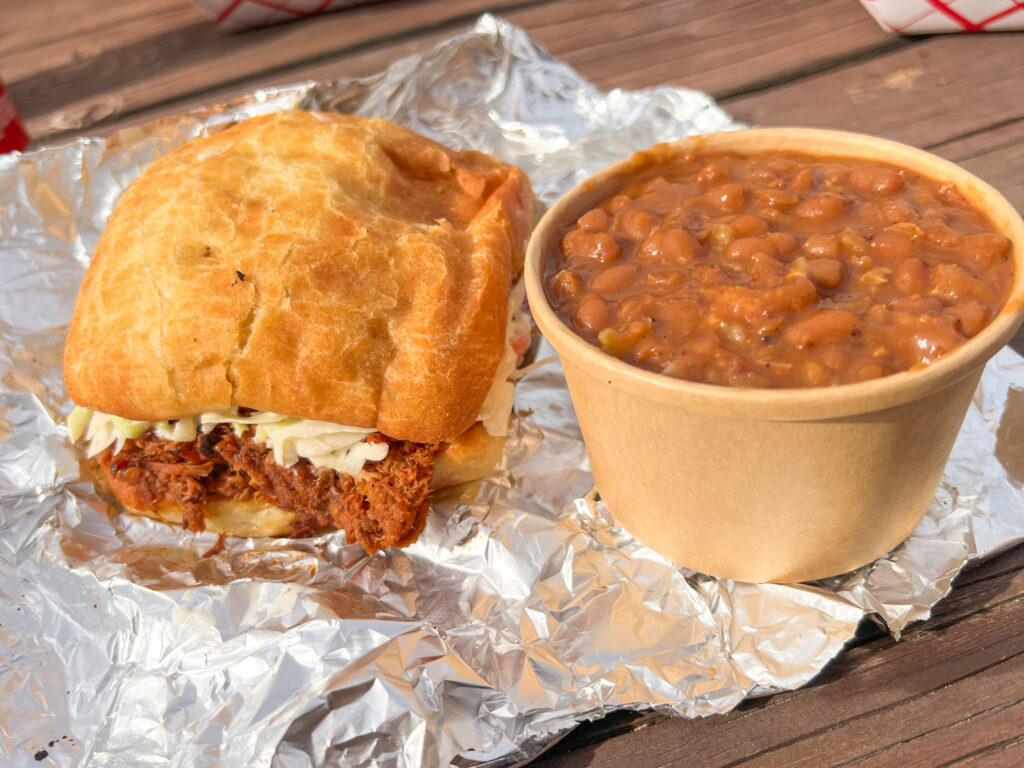 BBQ sandwich and beans  at Follow Yer' Nose BBQ Smokewagon during Gardiner Montana to Yellowstone National Park trip.