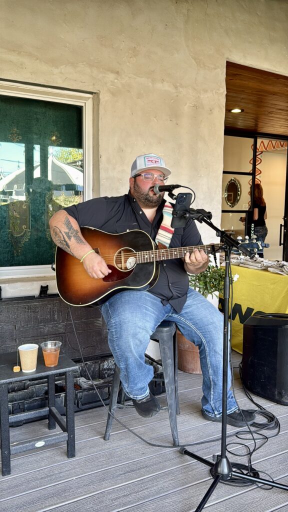 Person Singing and playing guitar