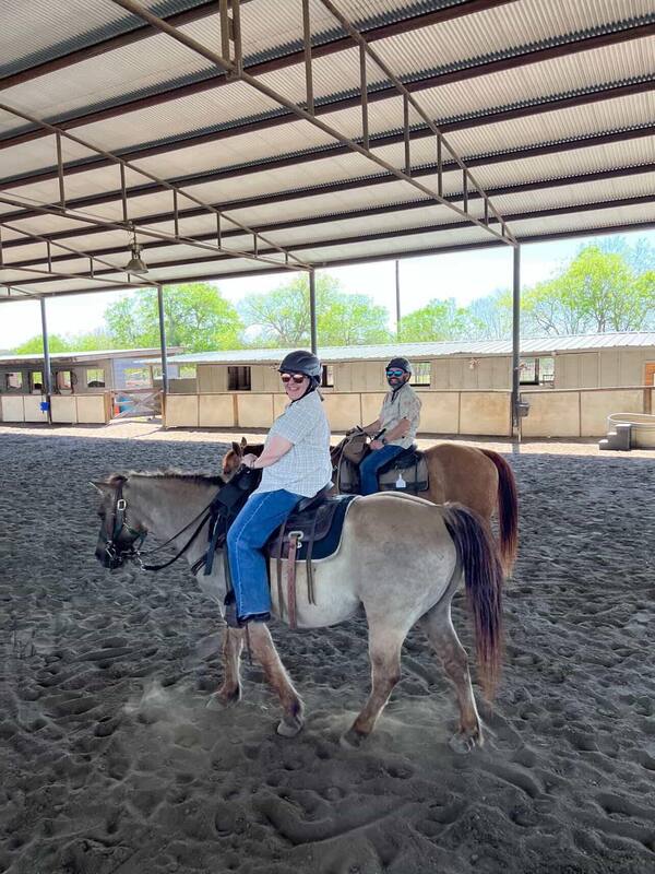 Melissa and Daniel on horseback at Lone Star Ranch during Plano Outdoors Exhibition