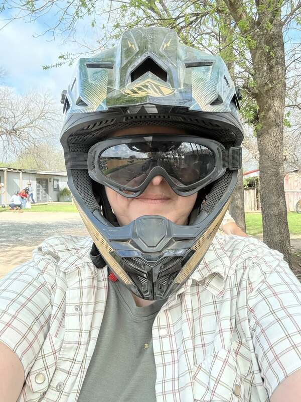 Melissa on an ATV at Lone Star Ranch during Plano Outdoors Exhibition