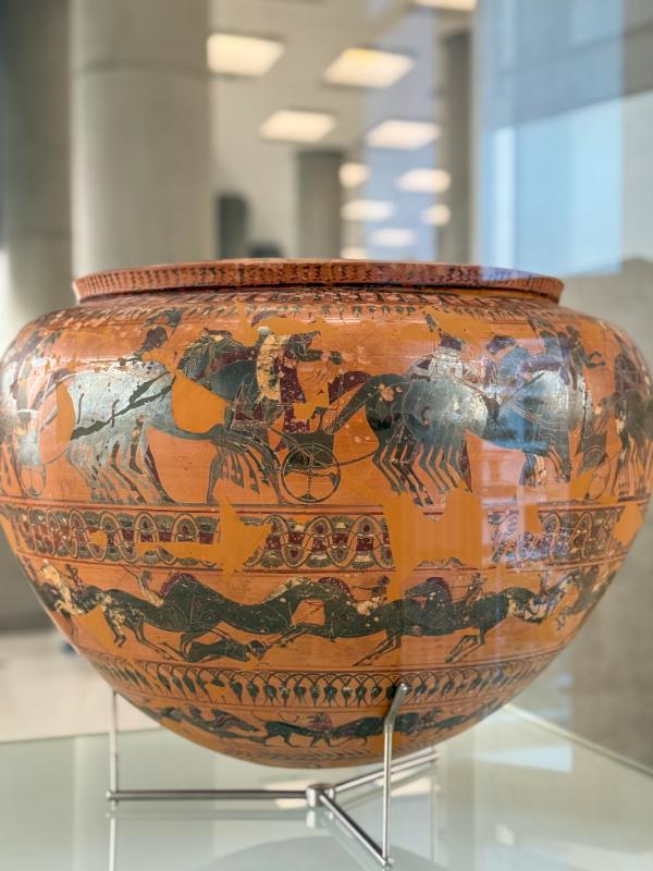 Vessel with battle scene