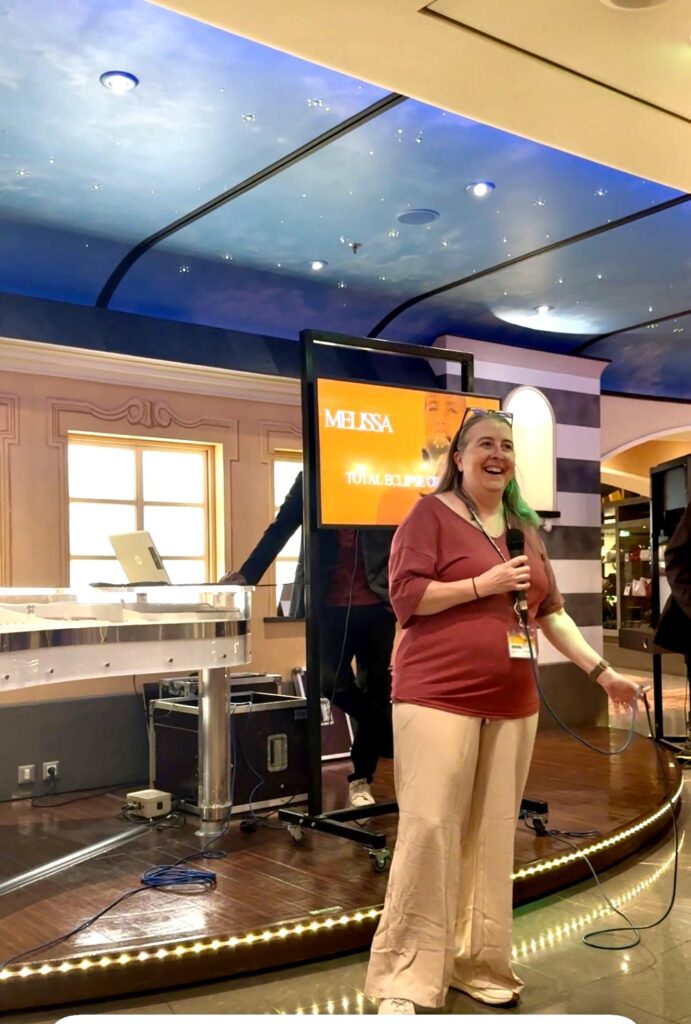 Melissa doing Karaoke on the MSC Fantasia
