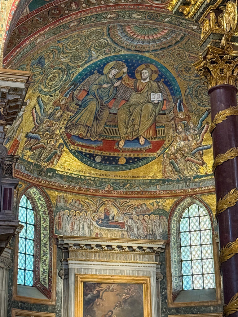 This image shows the apse mosaics inside the Papal Basilica of Saint Mary Major (Santa Maria Maggiore) in Rome, Italy.