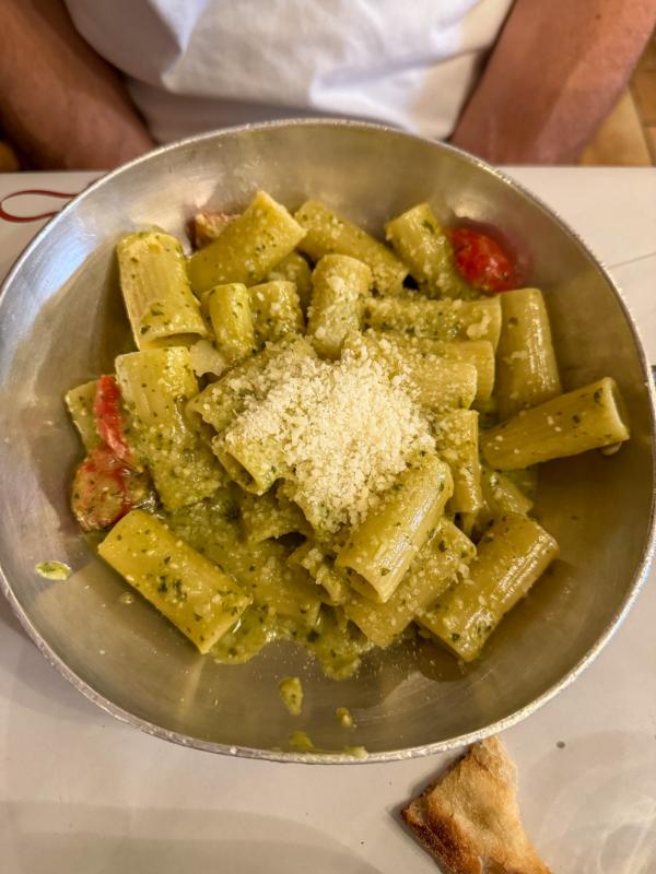 rigatoni al pesto with pine nuts and cherry tomatoes