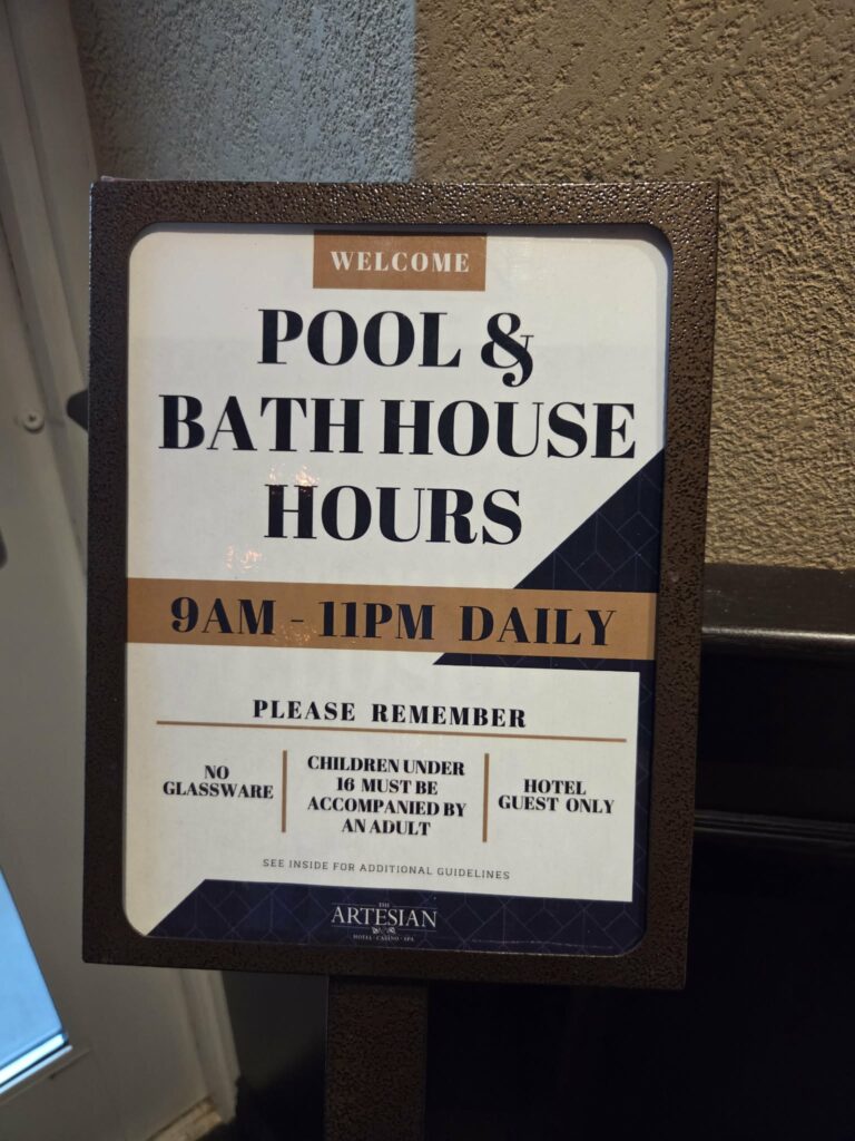Sign for Pool and Bathhouse Hours